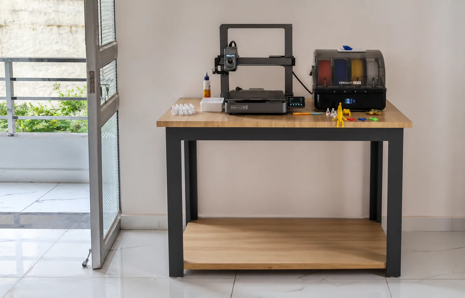 The organized 3D-printing workbench inside Makerhood's Sadulpur studio
